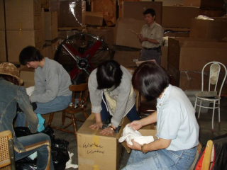 2011-01-11-volunteers-packing-at-the-warehouse