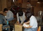 2011-01-11-volunteers-packing-at-the-warehouse